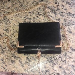 Bebe Black crossbody with gold chain